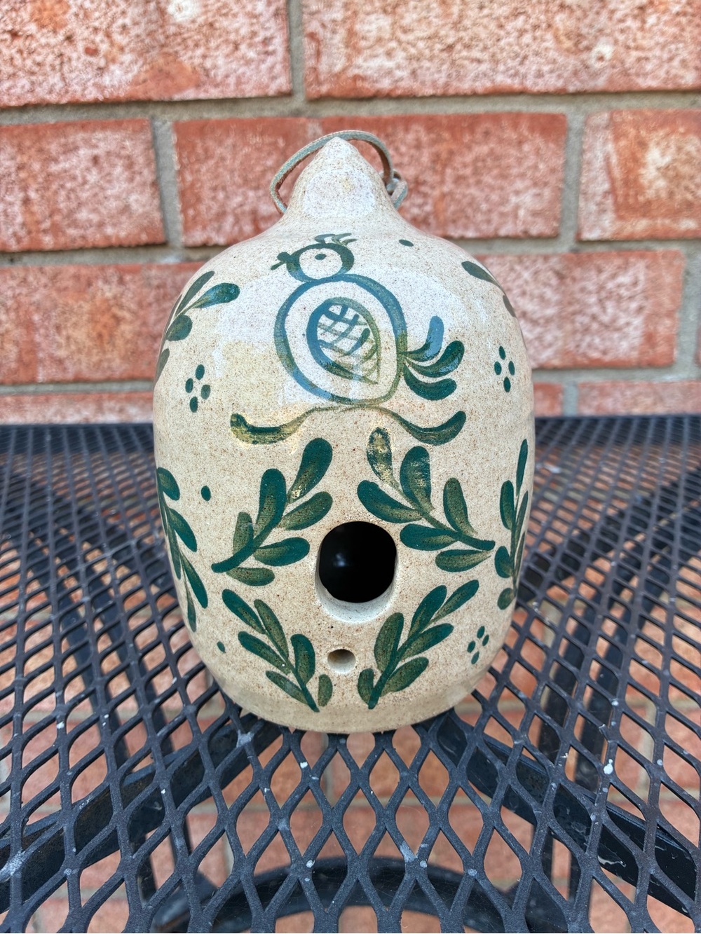 Hand-Painted Ceramic Birdhouse with Green Leaf Motif